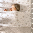 Living Textiles Reversable Jersey Cot Comforter - Sloth/Rainbow